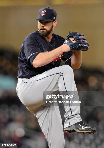 Boone Logan of the Cleveland Indians delivers a pitch against the Minnesota Twins during the game on April 18, 2017 at Target Field in Minneapolis,...