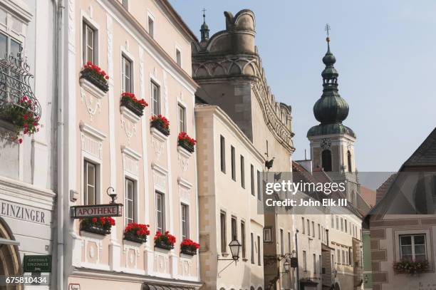 krems an der donau stein street with nikolauskirche church - krems austria stock pictures, royalty-free photos & images