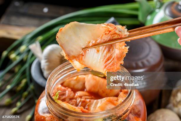 fresh kimchee - kimchi stock pictures, royalty-free photos & images