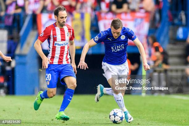 Jamie Vardy of Leicester City is followed by Juan Francisco Torres Belen, Juanfran, of Atletico de Madrid during their 2016-17 UEFA Champions League...