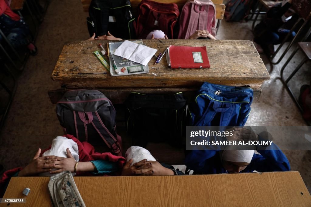 TOPSHOT-SYRIA-CONFLICT-CHILDREN