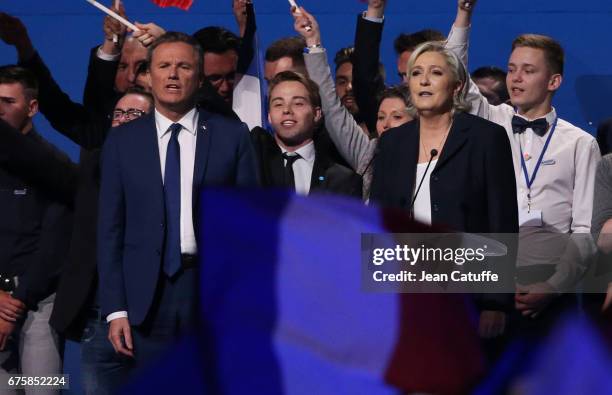 French presidential candidate Marine Le Pen of 'Front National' party is joined on stage by Nicolas Dupont-Aignan, President of 'Debout la France'...