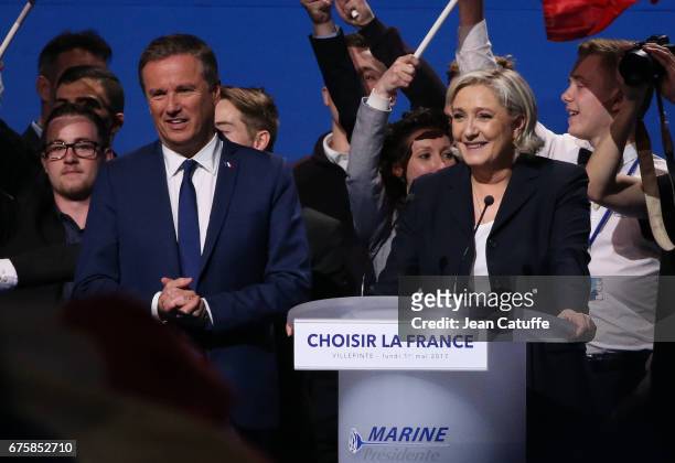 French presidential candidate Marine Le Pen of 'Front National' party is joined on stage by Nicolas Dupont-Aignan, President of 'Debout la France'...