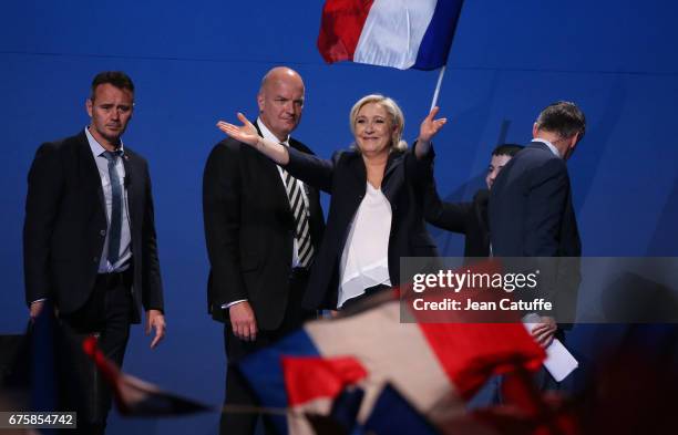 French presidential candidate Marine Le Pen of Front National party - here protected by her personal bodyguard Thierry Legier - holds a campaign...