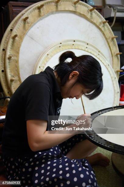 a japanese woman making japanese drum - make music day stock pictures, royalty-free photos & images