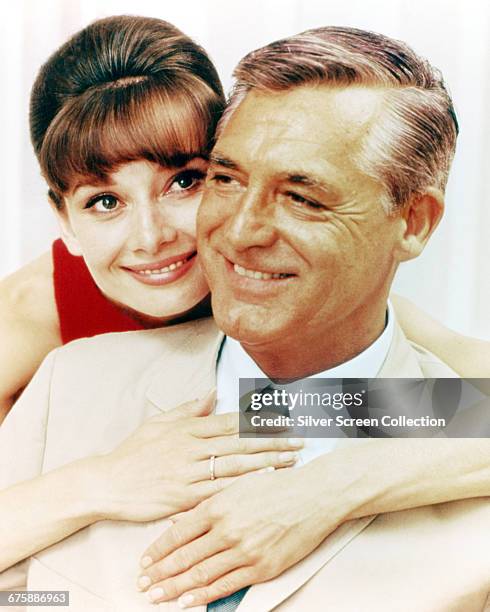 Actors Cary Grant as Peter Joshua and Audrey Hepburn as Regina Lampert in a publicity still for the film 'Charade', 1963.