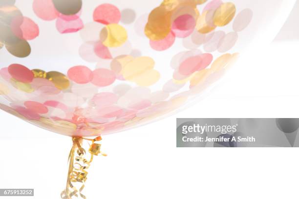 confetti balloon - pastel confetti stock pictures, royalty-free photos & images