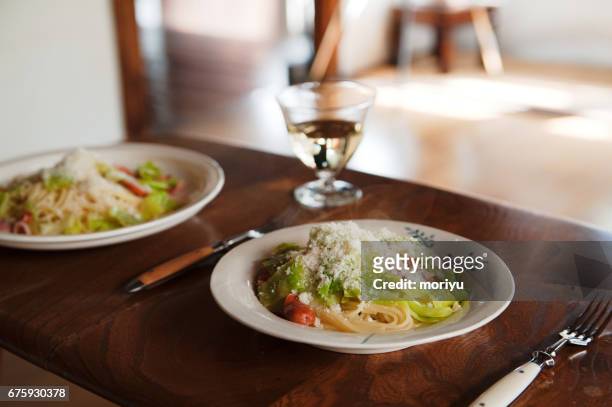 pasta lunch - チーズ stock pictures, royalty-free photos & images