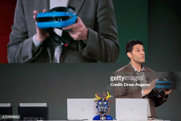 Terry Myerson, executive vice president of the Microsoft Windows and Devices Group, speaks about the Acer Windows VR headset during a Microsoft...