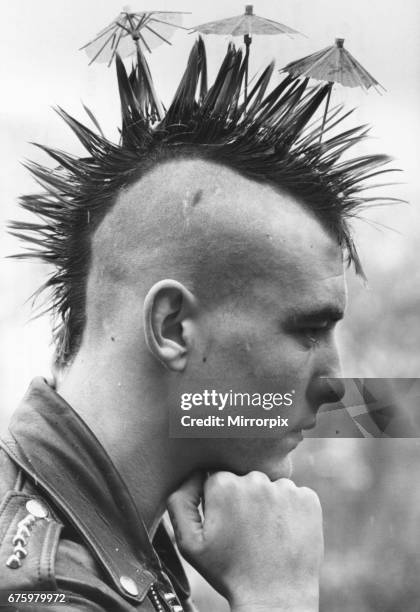 Mike the spike Lang with his Mohican haircut complete with tiny cocktail umbrellas. March 4 1981.