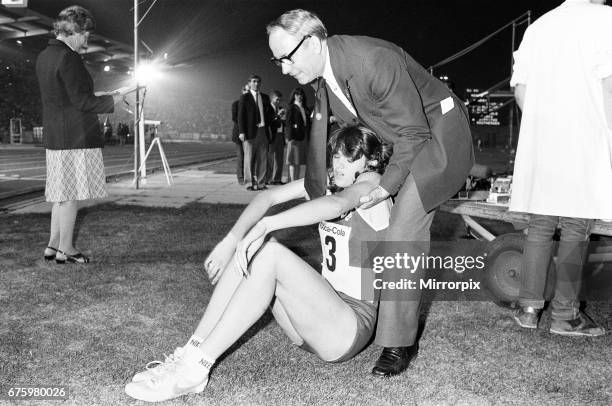 British athlete Kathy Smallwood exhausted after winning the Women's 400 metres race at the Coca Cola Athletics meeting at Crystal Palace. 17th...