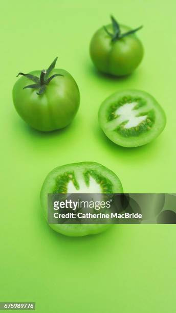 green tomatoes - catherine macbride stockfoto's en -beelden