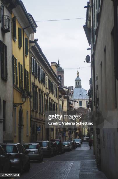 italy, brescia, a street and cuppola of new cathedral - struttura edile fotografías e imágenes de stock