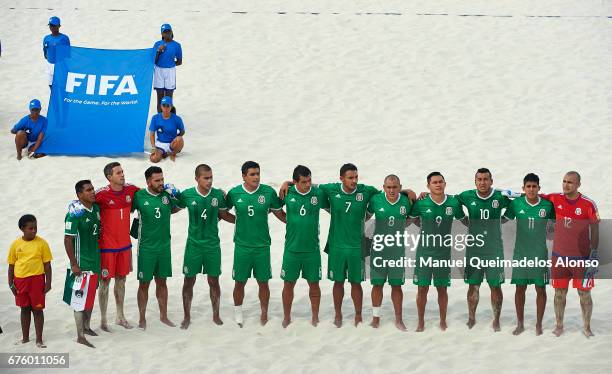 The Mexico team sing the national anthem during the FIFA Beach Soccer World Cup Bahamas 2017 group B match between Italy and Mexico at National Beach...