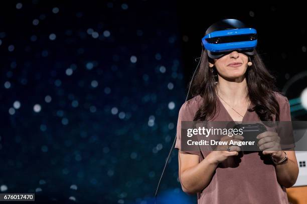 Microsoft employee demonstrates a Acer Windows VR headset during a Microsoft launch event, May 2, 2017 in New York City. The Windows 10 S operating...