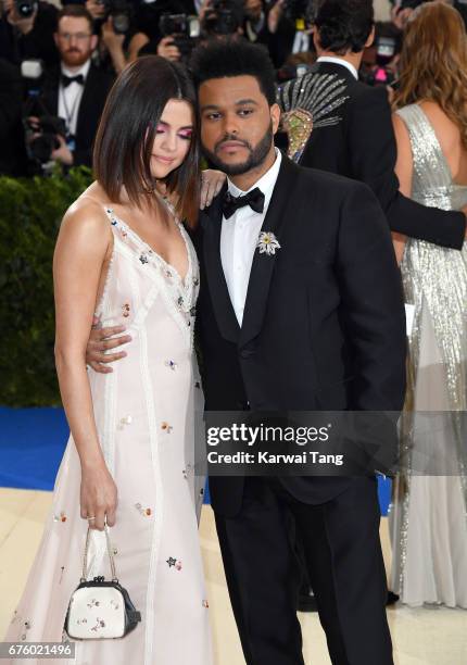 Selena Gomez and The Weeknd attend the "Rei Kawakubo/Comme des Garcons: Art Of The In-Between" Costume Institute Gala at the Metropolitan Museum of...