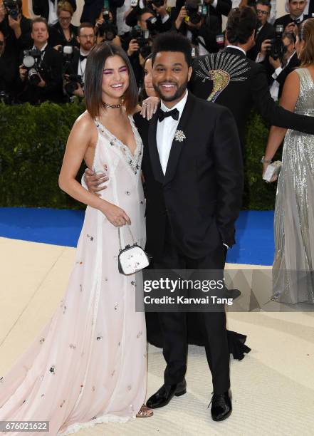 Selena Gomez and The Weeknd attend the "Rei Kawakubo/Comme des Garcons: Art Of The In-Between" Costume Institute Gala at the Metropolitan Museum of...