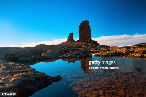 roque nublo view in the sunset time - tejeda stock pictures, royalty-free photos & images