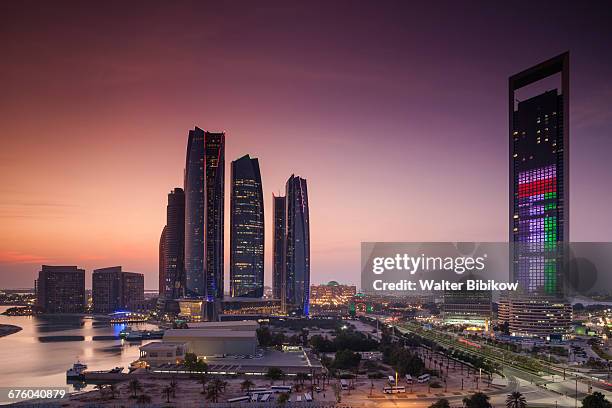 uae, abu dhabi, exterior - abu dhabi skyline stock pictures, royalty-free photos & images