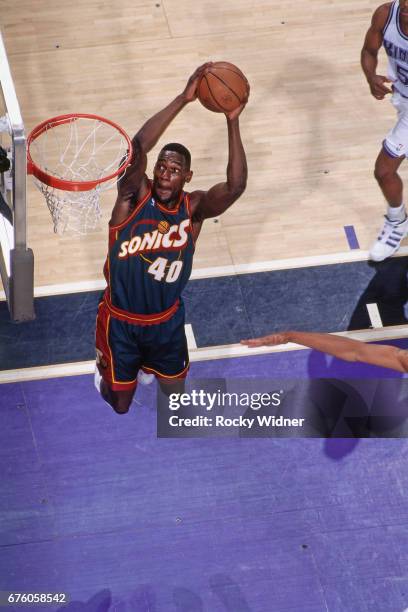 Shawn Kemp of the Seattle SuperSonics dunks against the Sacramento Kings circa 1995 at Arco Arena in Sacramento, California. NOTE TO USER: User...