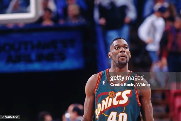 Shawn Kemp of the Seattle SuperSonics looks on against the Sacramento Kings circa 1995 at Arco Arena in Sacramento, California. NOTE TO USER: User...