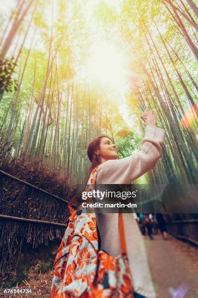 girl on excursion in japan - explorador imagens e fotografias de stock