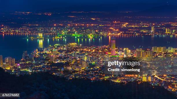 penang, malaysia night view - penang stockfoto's en -beelden