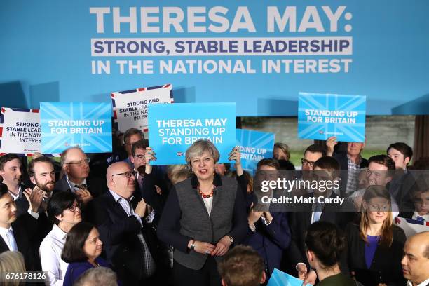 Britain's Prime Minister Theresa May addresses an audience of supporters during a campaign stop on May 2, 2017 in Bristol, England. The Prime...