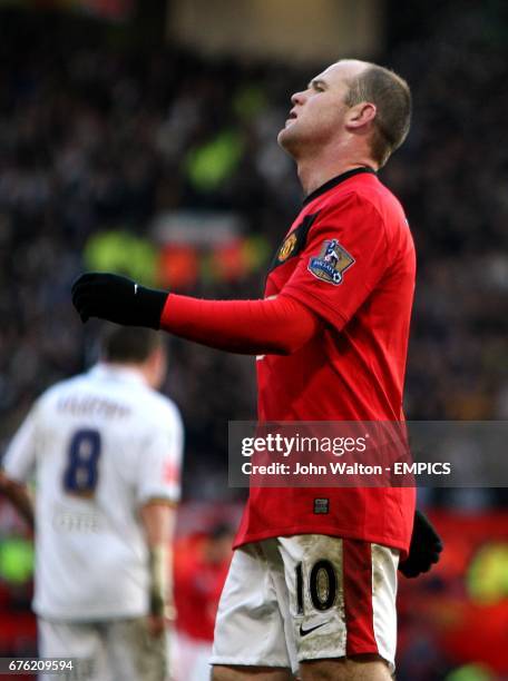 Manchester United's Wayne Rooney reacts after seeing his shot go over the bar