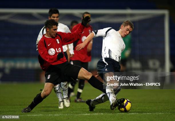 Bolton Wanderers' Graeme Macgregor and Fulham's Cristian Marquez Sanchez