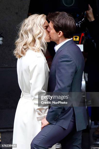 Tom Cruise seen kissing Vanessa Kirby during a scene for 'Mission Impossible 6' in Paris, France, on May 2, 2017.