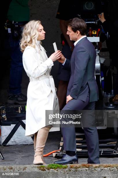 Tom Cruise seen kissing Vanessa Kirby during a scene for 'Mission Impossible 6' in Paris, France, on May 2, 2017.