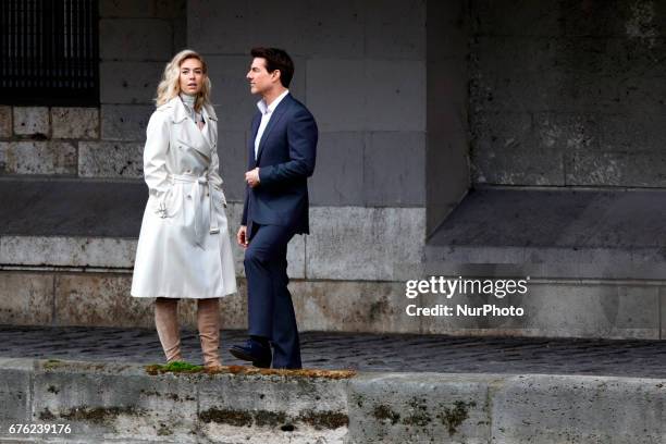 Tom Cruise seen kissing Vanessa Kirby during a scene for 'Mission Impossible 6' in Paris, France, on May 2, 2017.