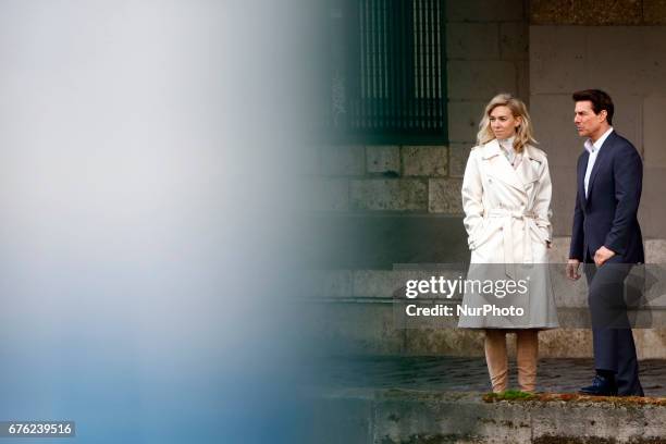 Tom Cruise seen kissing Vanessa Kirby during a scene for 'Mission Impossible 6' in Paris, France, on May 2, 2017.