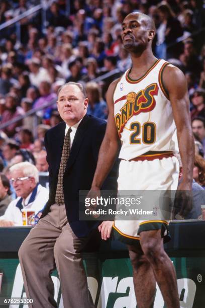 George Karl and Gary Payton of the Seattle SuperSonics looks on against the Los Angeles Lakers circa 1996 at Key Arena in Seattle, Washington. NOTE...