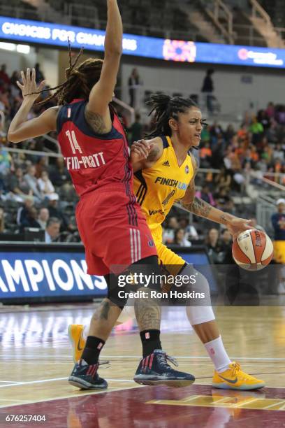 Candice Dupree of the Indiana Fever handles the ball against the Washington Mystics on May 2, 2017 at Indiana Farmers Coliseum in Indianapolis,...