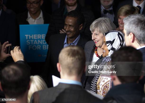 Britain's Prime Minister Theresa May addresses an audience of supporters during a campaign stop on May 2, 2017 in Bristol, England. The Prime...