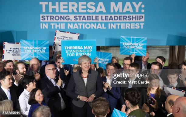 Britain's Prime Minister Theresa May addresses an audience of supporters during a campaign stop on May 2, 2017 in Bristol, England. The Prime...
