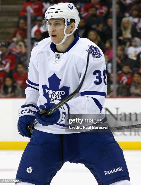 Colin Greening of the Toronto Maple Leafs plays in the game against the New Jersey Devils at the Prudential Center on April 9, 2016 in Newark, New...