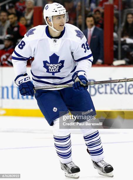 Colin Greening of the Toronto Maple Leafs plays in the game against the New Jersey Devils at the Prudential Center on April 9, 2016 in Newark, New...