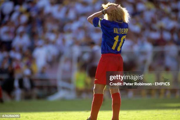 Colombia's captain Carlos Valderrama can't hide his disappointment as his side trail Romania by three goals to one.