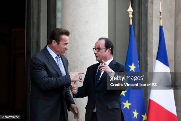French President Francois Hollande receives Former Governor of California and current Founding President of Regions of Climate Action Arnold...
