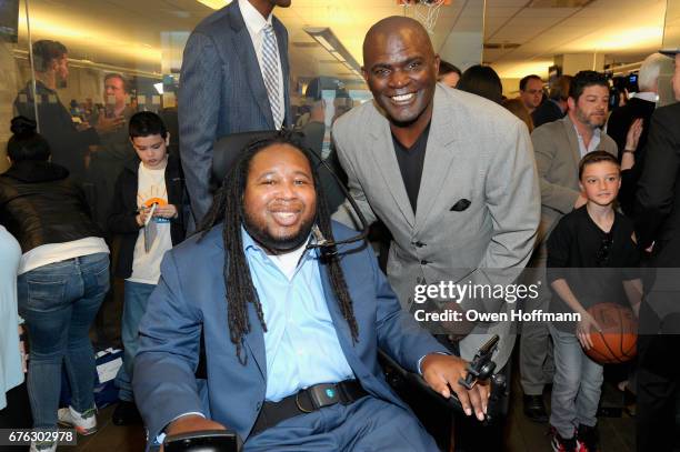 Former football player Eric LeGrand and former NFL player Lawrence Taylor attend BTIG's 15th Commissions for Charity Day at BTIG on May 2, 2017 in...