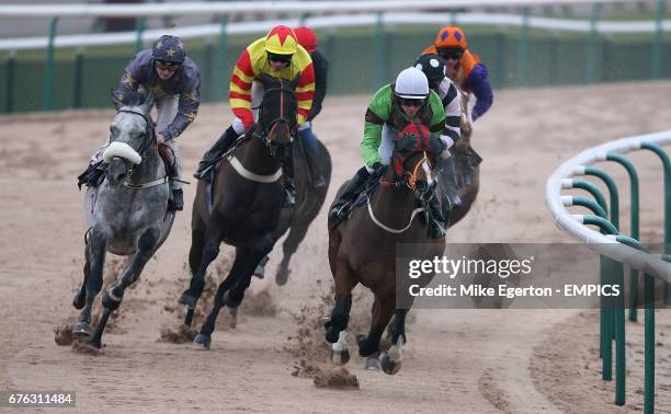 Doubnov ridden by Steve Drowne goes around the first bend on its way to wnning The Dine in the Queen Mothers Restaurant Claiming Stakes