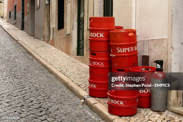 Super Bock beer barrells stand in the street in the Barrio Alto area of Lisbon