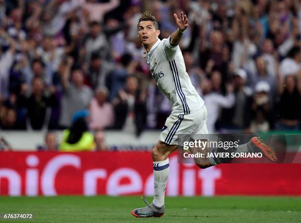 Real Madrid's Portuguese forward Cristiano Ronaldo celebrates his second goal during the UEFA Champions League semifinal first leg football match...