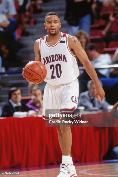 Damon Stoudemire of the Arizona Wildcats dribbles during a game played circa 1994 at Arco Arena in Sacramento, California. NOTE TO USER: User...