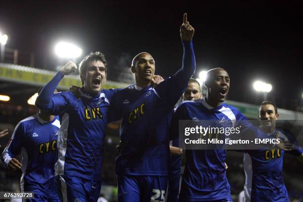 Millwall's Sean Batt celebrates his goal with Jimmy Adou and Danny Schofield