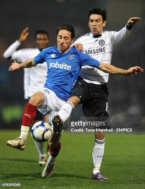 Chelsea's Paulo Ferreira and Portsmouth's Tommy Smith battle for the ball.