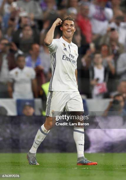 Cristiano Ronaldo of Real Madrid celebrates as he scores their third goal and completes his hat trick during the UEFA Champions League semi final...